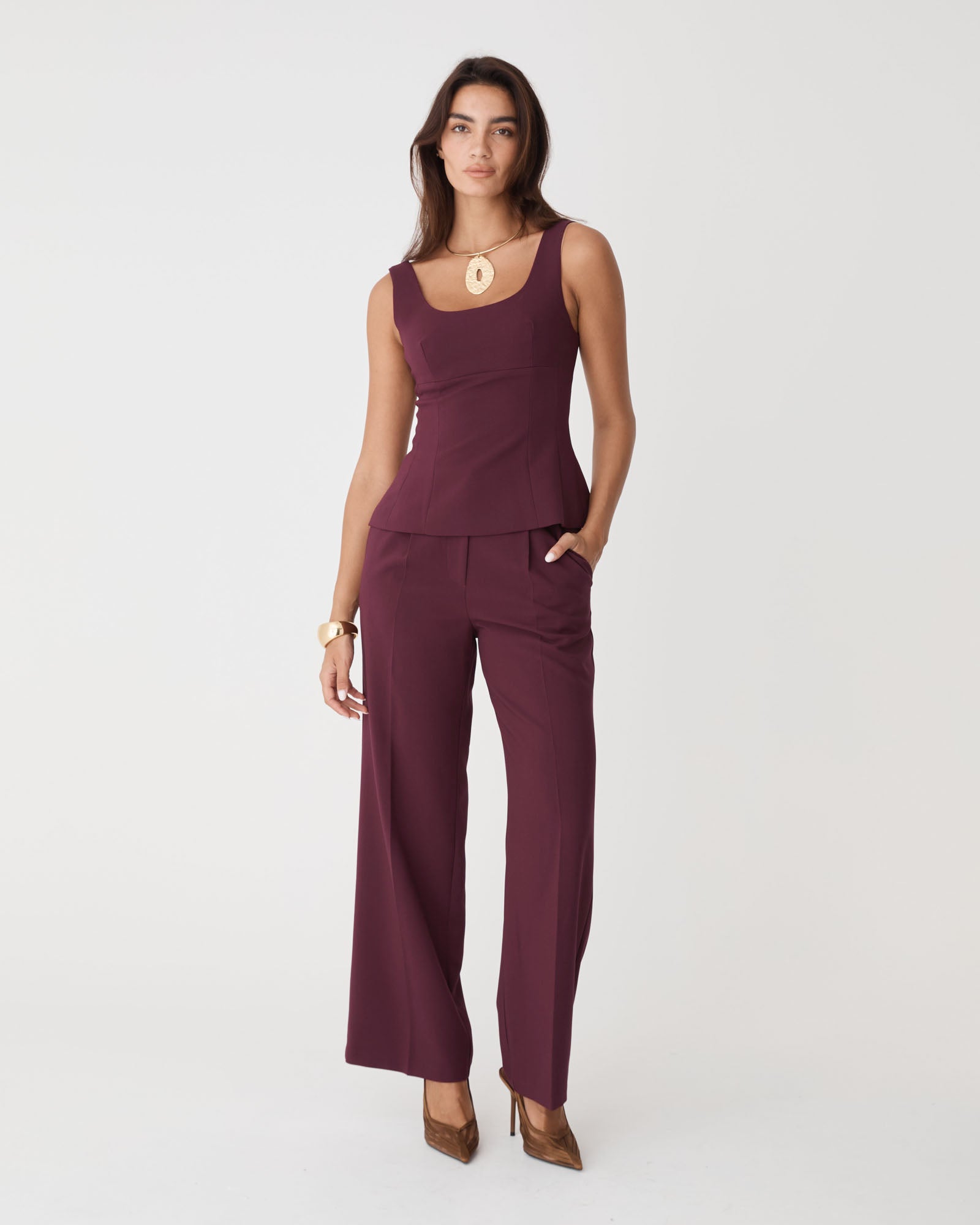 Nikki Peplum Top