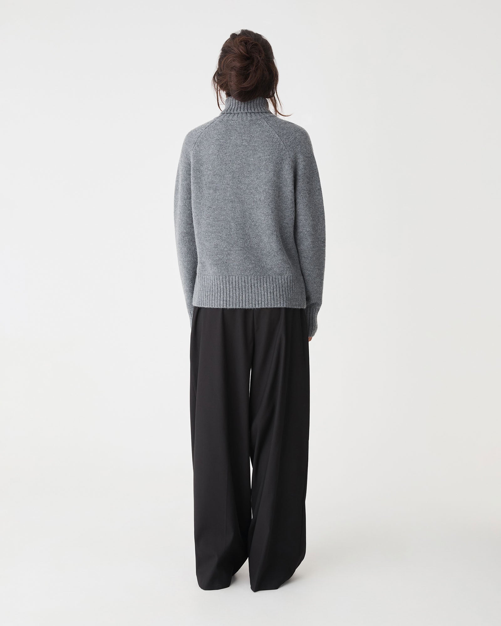 Jada Notch Hem Turtleneck Knit