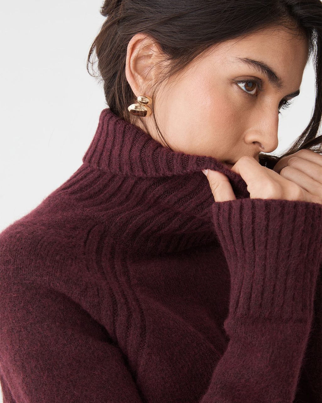 Jada Notch Hem Turtleneck Knit